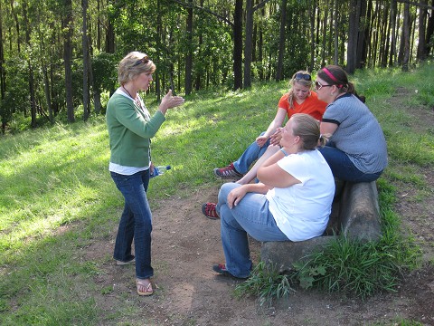 Karen preaching to Racers