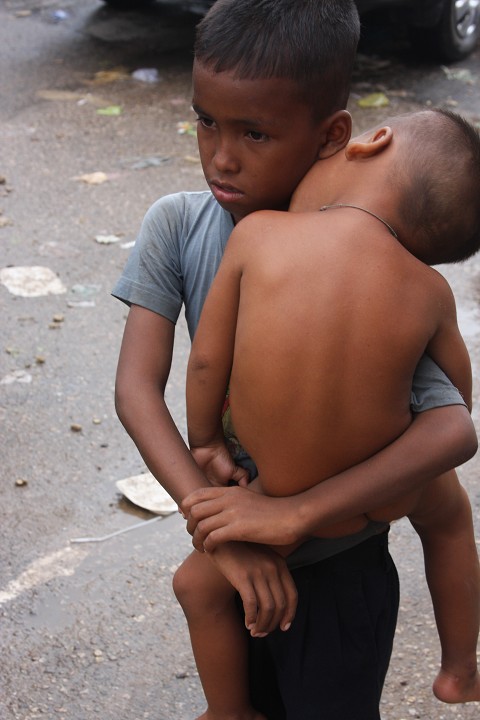 '08 Year-end giving 2 holding an orphan